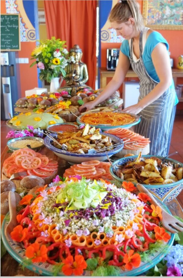 A buffet table with many different types of food.